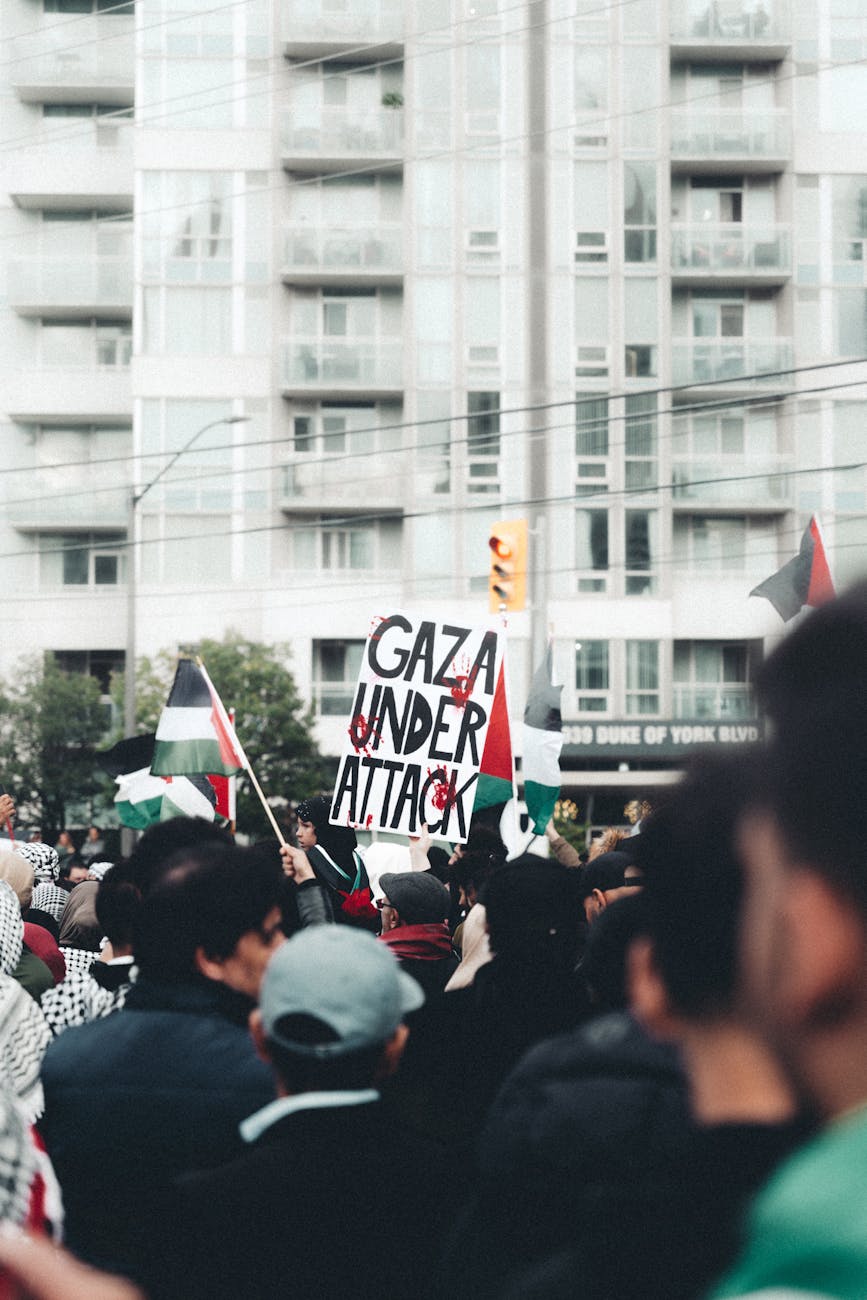 a crowd protesting on the street